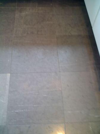 Rare black Honed Limestone floor before cleaning and sealing
