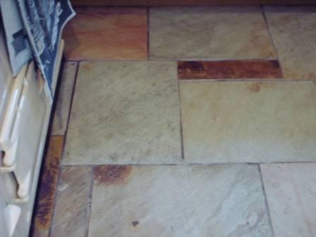 Picture shows how the sealer has brought out the colour in this Sandstone kitchen floor.